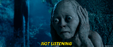 A screenshot from the movie 'The Lord of the Rings: The Two Towers', in which Smeagol covers his ears and announces he is "not listening".